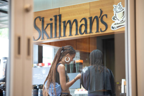 Students chat outside of Skillman Cafe.