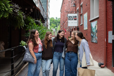 Students smile in downtown Easton.