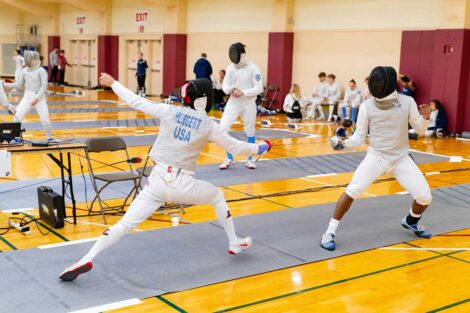 Two students fence