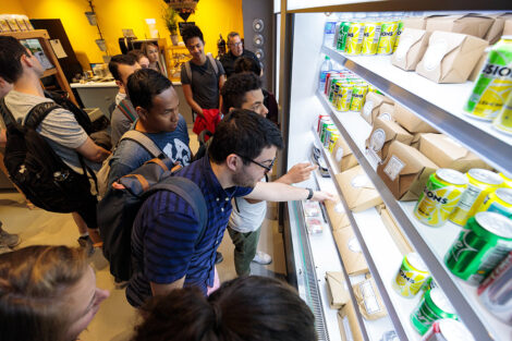 Students look at food at ECO cafe