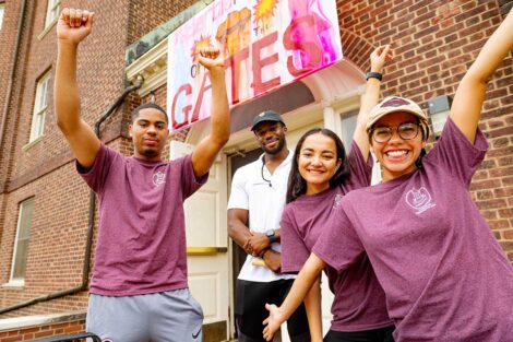 Students celebrate in front of Gates Hall